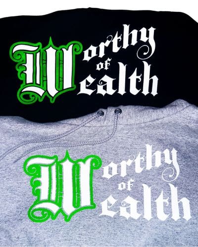 The W Hoodie: a grey hoodie with "Worthy of Wealth" in green and white blackletter.